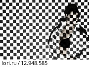 Beautiful woman covered with black and white squares. Стоковое фото, фотограф Art Konovalov / Фотобанк Лори