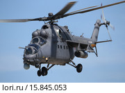 Боевой вертолёт Ми-35М ВВС России с подвешенными блоками неуправляемых ракет С-8КОМ. Редакционное фото, фотограф Михеев Алексей / Фотобанк Лори