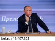 Президент Российской Федерации Владимир Владимирович Путин на одинацатой большой ежегодной пресс-конференции в Центре международной торговли на Красной Пресне в центре города Москвы, Россия (2015 год). Редакционное фото, фотограф Николай Винокуров / Фотобанк Лори