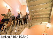 Nizhny Novgorod, Russia - 03.11.2015. People walking down the stairs in museum estate Rukavishnikov. Редакционное фото, фотограф Володина Ольга / Фотобанк Лори
