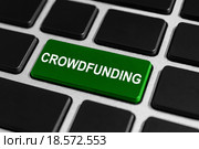 crowdfunding button on keyboard. Стоковое фото, фотограф Pichet Wissawapipat / PantherMedia / Фотобанк Лори