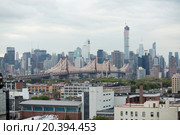 Queensboro Bridge with cars at summer cloudy day. (2014 год). Стоковое фото, фотограф Losevsky Pavel / Фотобанк Лори