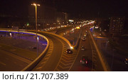 Движение автомобилей по транспортной развязке: Ленинградский проспект - третье транспортное кольцо. Съемка с коптера. RAW. Стоковое видео, видеограф Евгений Ковалев / Фотобанк Лори