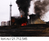 Пожар в резервуарном парке компании "Лукойл". Усинск, Коми  2014 год. Редакционное фото, фотограф Сергей Гаврилов / Фотобанк Лори