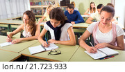 Students in classroom on exam. Стоковое фото, фотограф Яков Филимонов / Фотобанк Лори