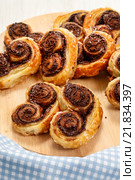 Palmier biscuits - french cookies made of puff pastry and chocolate. Стоковое фото, агентство BE&W Photo / Фотобанк Лори