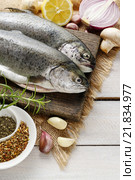 Two rainbow trouts on rustic wooden table, copy space. Стоковое фото, агентство BE&W Photo / Фотобанк Лори