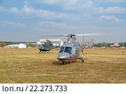 Международный авиационно-космический салон МАКС-2015. Итальянский вертолет Agusta A109S Grand прогревает двигатель перед полетом. Редакционное фото, фотограф Игорь Долгов / Фотобанк Лори