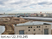 Пустырь замороженного проекта "Набережная Европы" на фоне стрелки Васильевского острова в Санкт-Петербурге (2016 год). Редакционное фото, фотограф Sergei Gushchin / Фотобанк Лори