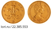 Монета 2 пенса 1971 года, изолировано на белом фоне, Великобритания (2012 год). Редакционное фото, фотограф Ростислав Агеев / Фотобанк Лори