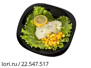 Рыбное блюдо на чёрной тарелке. Fish dish on a black plate. Стоковое фото, фотограф Олег Безруков / Фотобанк Лори