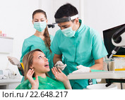Dentist and scared patient. Стоковое фото, фотограф Яков Филимонов / Фотобанк Лори