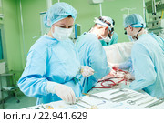 surgeons at work. female doctors operating in child surgery hospital. Стоковое фото, фотограф Дмитрий Калиновский / Фотобанк Лори
