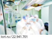 surgery and surgical operation. Mediacal dropper with anesthetics. Стоковое фото, фотограф Дмитрий Калиновский / Фотобанк Лори