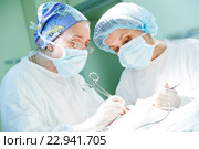 surgeons at work. female doctors operating in child surgery hospital. Стоковое фото, фотограф Дмитрий Калиновский / Фотобанк Лори