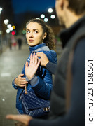 Couple having quarrel in evening outdoors. Стоковое фото, фотограф Яков Филимонов / Фотобанк Лори