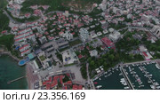 Вертикальная панорама города Будва во время заката. Черногория. Вид сверху (2016 год). Стоковое видео, видеограф Кекяляйнен Андрей / Фотобанк Лори