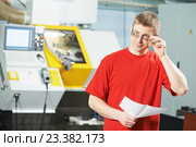 industrial worker portrait at tool workshop. Стоковое фото, фотограф Дмитрий Калиновский / Фотобанк Лори