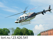 Взлетающий вертолет Bell 407GX (RA-01605) крупным планом (2016 год). Редакционное фото, фотограф Виктор Карасев / Фотобанк Лори