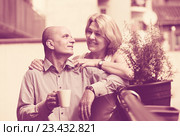 Aged couple drink tea on balcony. Стоковое фото, фотограф Яков Филимонов / Фотобанк Лори