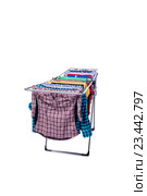 Collapsible clotheshorse isolated on the white background. Стоковое фото, фотограф Elnur / Фотобанк Лори