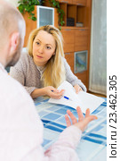 Family reading financial documents. Стоковое фото, фотограф Яков Филимонов / Фотобанк Лори