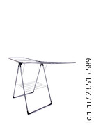 Collapsible clotheshorse isolated on the white background. Стоковое фото, фотограф Elnur / Фотобанк Лори