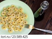 Тортелли́ни (итал. Tortellini) — итальянские пельмени из пресного теста с мясом, сыром или овощами (народн. сленг - "пупок") Стоковое фото, фотограф Леонид Штандель / Фотобанк Лори