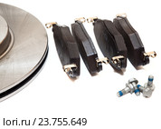 New brake pads and two steel ventilated brake disks isolated on white background. Стоковое фото, фотограф Кекяляйнен Андрей / Фотобанк Лори