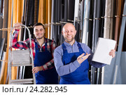 Two smiling workmen at factory. Стоковое фото, фотограф Яков Филимонов / Фотобанк Лори