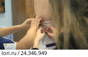 A bride getting dressed up for the wedding. Стоковое видео, видеограф worker / Фотобанк Лори