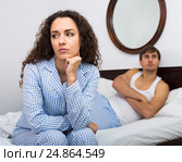 Young couple having quarrel in bedroom. Стоковое фото, фотограф Яков Филимонов / Фотобанк Лори