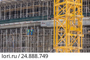 Team of construction worker on construction site. Стоковое фото, фотограф Matej Kastelic / Фотобанк Лори