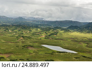Kronotsky Nature Reserve on Kamchatka Peninsula. View from helicopter. (2016 год). Редакционное фото, фотограф Юлия Машкова / Фотобанк Лори