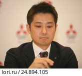 Пресс-конференция официального дистрибьютора автомобилей Mitsubishi на территории России -компании «ММС Рус» (Mitsubishi Motors). Президент и исполнительный директор ООО «ММС Рус» Накамура Наоя. (2017 год). Редакционное фото, фотограф Александр С. Курбатов / Фотобанк Лори