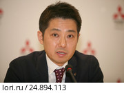 Пресс-конференция официального дистрибьютора автомобилей Mitsubishi на территории России -компании «ММС Рус» (Mitsubishi Motors). Президент и исполнительный директор ООО «ММС Рус» Накамура Наоя. (2017 год). Редакционное фото, фотограф Александр С. Курбатов / Фотобанк Лори