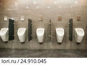 Many urinals in a toilet. Стоковое фото, фотограф Николай Голицынский / Фотобанк Лори