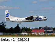 Самолет Ан-24РВ (бортовой RA-46481) авиакомпании UTair Express вылетает из Внукова (2011 год). Редакционное фото, фотограф Alexei Tavix / Фотобанк Лори