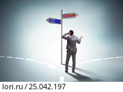 Businessman in Brexit concept - UK leaving EU. Стоковое фото, фотограф Elnur / Фотобанк Лори