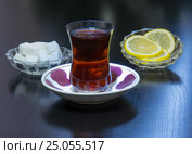 Чай налитый в стакан армуд с лимоном и сахаром. Стоковое фото, фотограф Василий Мальцев / Фотобанк Лори