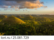 Landscape in Philippines, sunset over the chocolate hills on Bohol Island. Стоковое фото, фотограф Ершов Максим / Фотобанк Лори