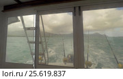 Fishing tackles on the back side of sailing yacht. Стоковое видео, видеограф Данил Руденко / Фотобанк Лори