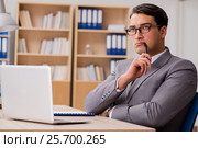 Young handsome businessman working on office. Стоковое фото, фотограф Elnur / Фотобанк Лори