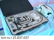 MOSCOW - APR 28, 2015: Suitcase with a gastroscope and a light source Pentax LH-150 PC in a modular tent of the field hospital. Редакционное фото, фотограф Losevsky Pavel / Фотобанк Лори