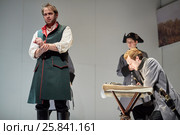 MOSCOW, RUSSIA - JAN 15, 2015: Actors K.Loskutov and S.Davydov as prisoner Rozhnov and Pretender on stage of Moscow theatre Et Cetera in play Boris Godunov directed by Peter Stein. Редакционное фото, фотограф Losevsky Pavel / Фотобанк Лори