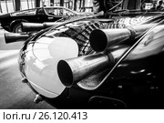 STUTTGART, GERMANY - MARCH 02, 2017: Exhaust pipes of a sports racing car Maserati Tipo 63 (Birdcage), 1959. Scuderia Serenissima. Black and white. Europe's greatest classic car exhibition "RETRO CLASSICS" Редакционное фото, фотограф Sergey Kohl / Фотобанк Лори