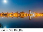 Reflection of the night city on the water surface. Стоковое фото, фотограф Сергей Ляшенко / Фотобанк Лори