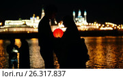 Kazan, Russia, 12 may 2017 - portrait pf loving couple at festival of floating Lanterns on Kazanka. Редакционное видео, видеограф Константин Шишкин / Фотобанк Лори