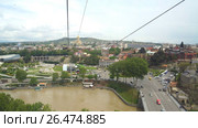 The view of the old town roofs and Kura River from the top of Sololaki Hill, Tbilisi, Georgia. Стоковое видео, видеограф Виктор Аллин / Фотобанк Лори