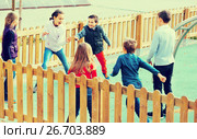Group of children playing romp game Touch-last outdoors. Стоковое фото, фотограф Яков Филимонов / Фотобанк Лори